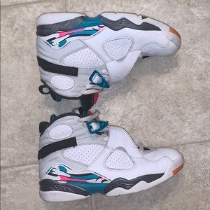 White, hot pink and turquoise Jordans
